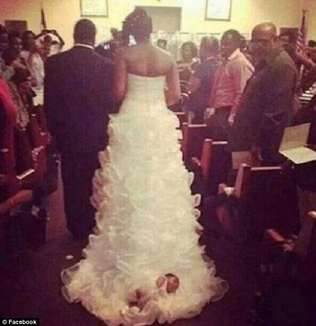 Bride Straps New Born Child To The Train Of Her Wedding Dress